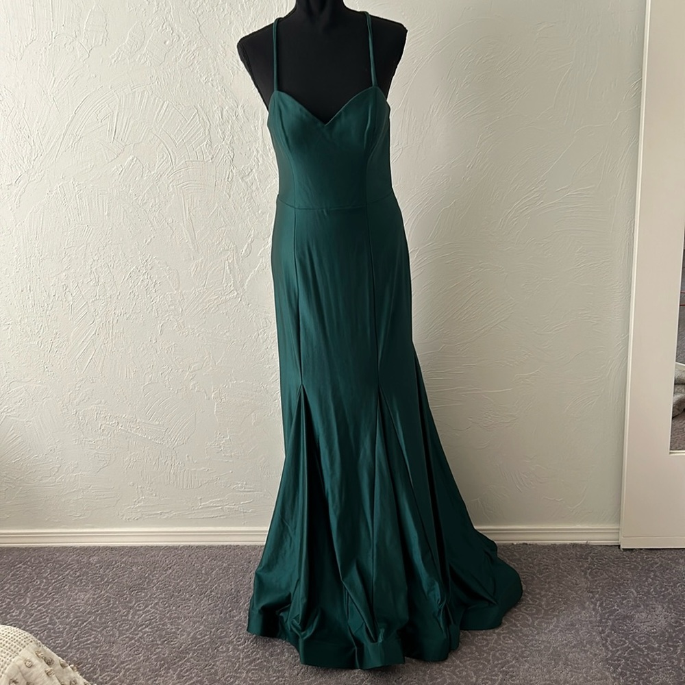 Emerald green mesh criss cross strap mermaid structured black tie gown